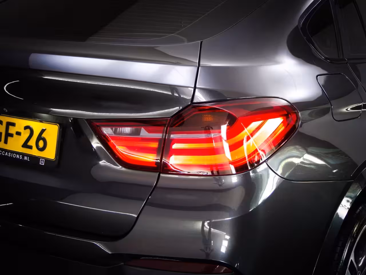 BMW X4 XDrive20i High Executive M-Sport (SCHUIF-/KANTELDAK, ACHTERUITRIJCAMERA, TREKHAAK, NAVIGAT