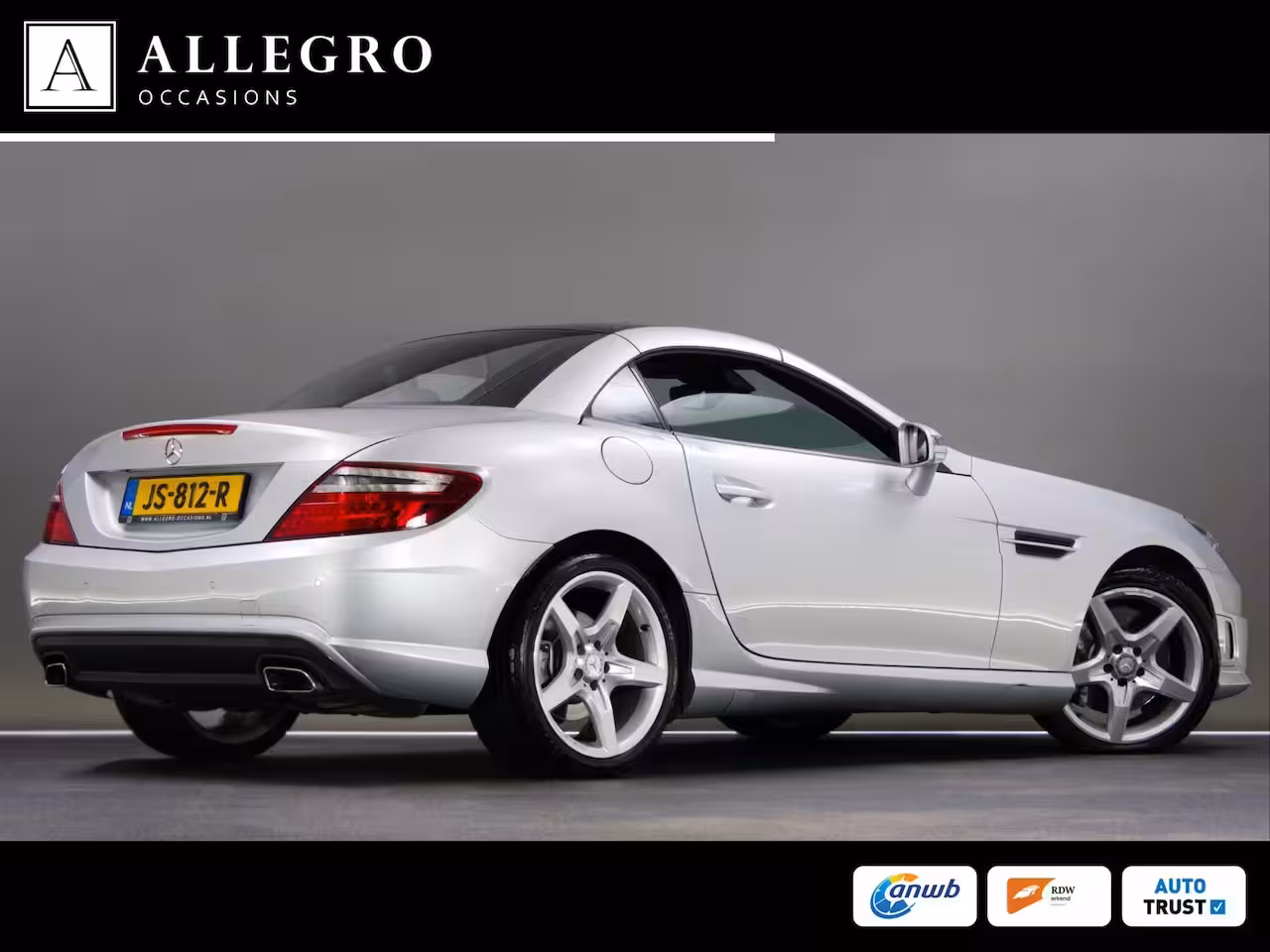 Mercedes-Benz SLK-klasse 200 AMG-Line (SFEERVERLICHTING, STOEL- & NEKVERWARMING, NAVIGATIESYSTEEM, CRUISE CONTROL,