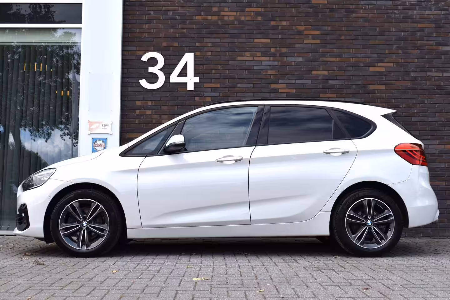 BMW 2-serie Active Tourer 220i HIGH EXE M-PAKKET LEDER NAVI