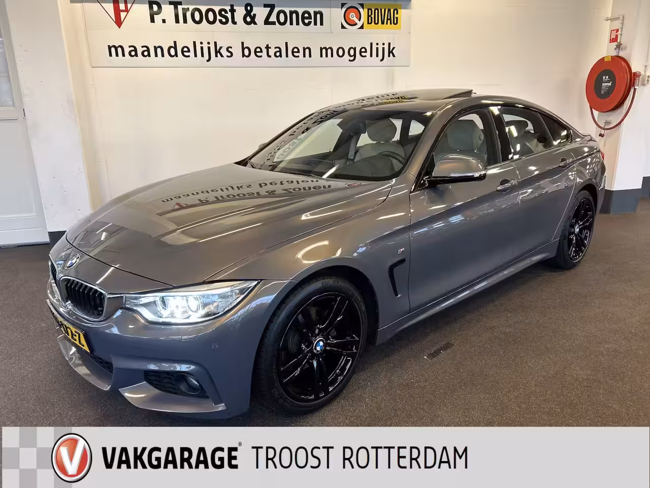 BMW 4-serie Gran Coupé 418i Individual M-pakket Schuifkanteldak/Automaat/Navigatie/Climate controle/Cruise cotrol
