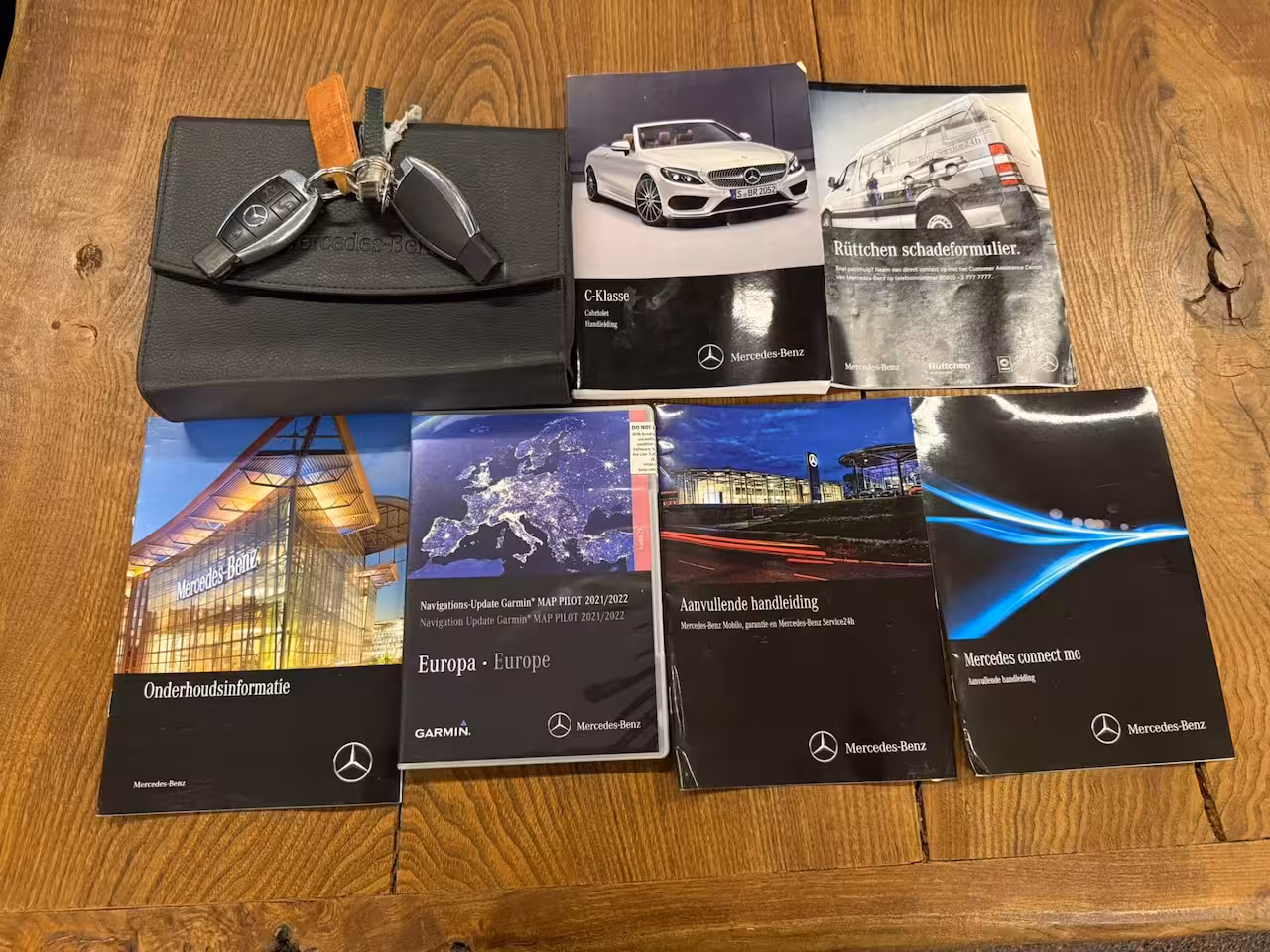 Mercedes-Benz C-klasse Cabrio 180 AMG | Airscarf | Burmester | 360 Camera | Origineel Nederlands | Cruise control | Clim