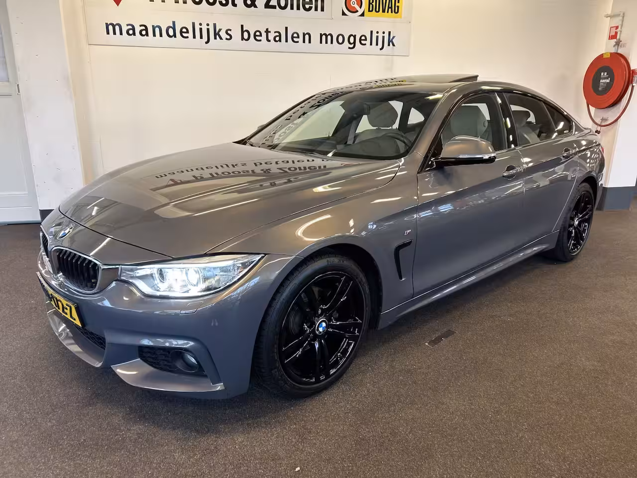 BMW 4-serie Gran Coupé 418i Individual M-pakket Schuifkanteldak/Automaat/Navigatie/Climate controle/Cruise cotrol
