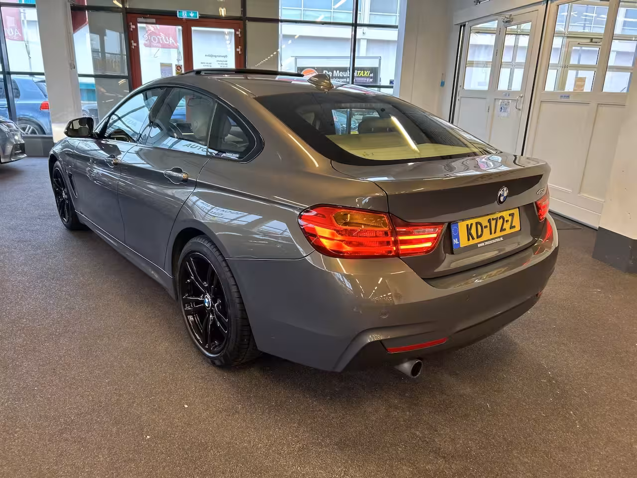 BMW 4-serie Gran Coupé 418i Individual M-pakket Schuifkanteldak/Automaat/Navigatie/Climate controle/Cruise cotrol
