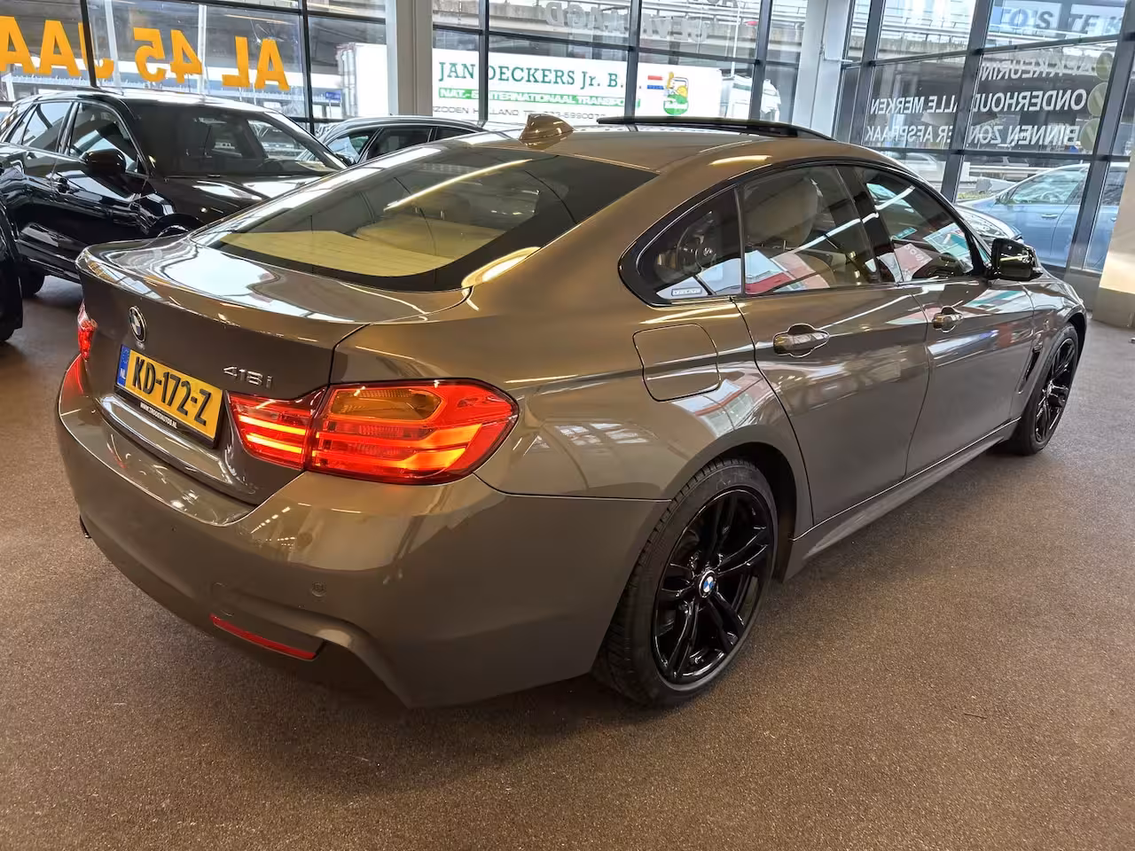 BMW 4-serie Gran Coupé 418i Individual M-pakket Schuifkanteldak/Automaat/Navigatie/Climate controle/Cruise cotrol
