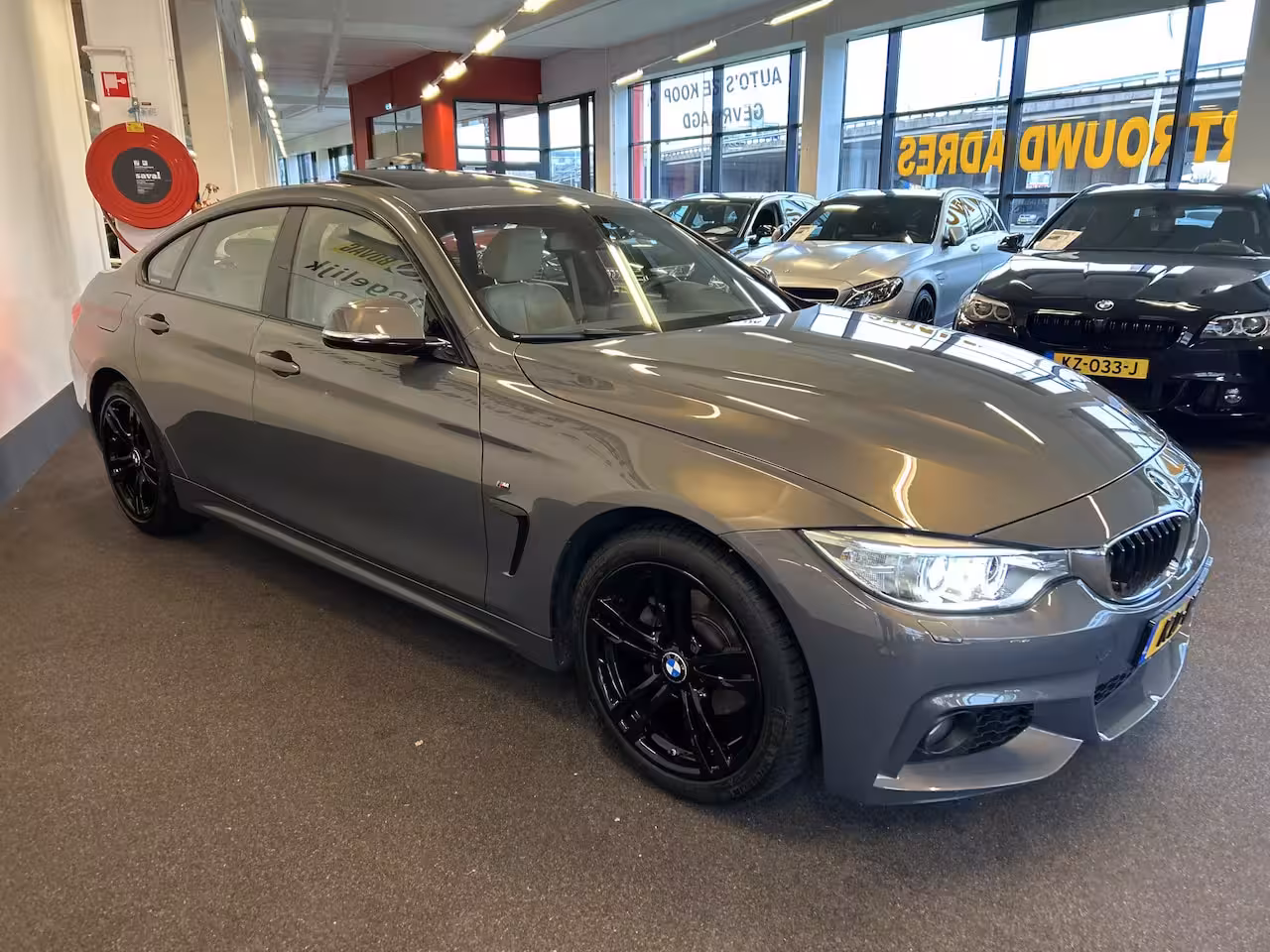 BMW 4-serie Gran Coupé 418i Individual M-pakket Schuifkanteldak/Automaat/Navigatie/Climate controle/Cruise cotrol