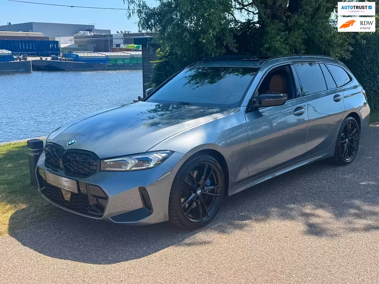 BMW 3-serie Touring 330i xDrive M Sport Laser Panodak Memory HuD VOL