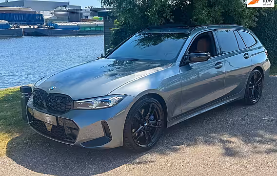 BMW 3-serie Touring 330i xDrive M Sport Laser Panodak Memory HuD VOL