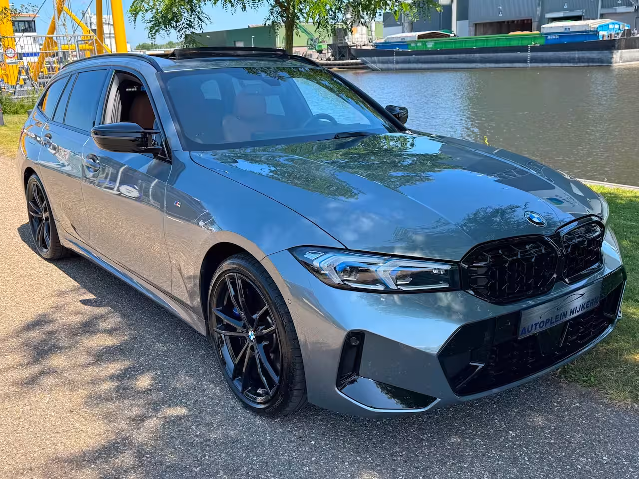 BMW 3-serie Touring 330i xDrive M Sport Laser Panodak Memory HuD VOL