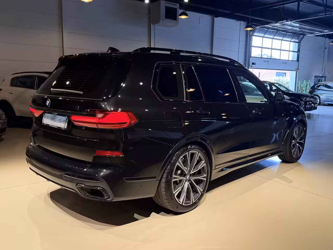 BMW X7 xDrive40i M-Pakket 7 Pers Panodak|Skylounge|Luchtvering Saphire Zwart