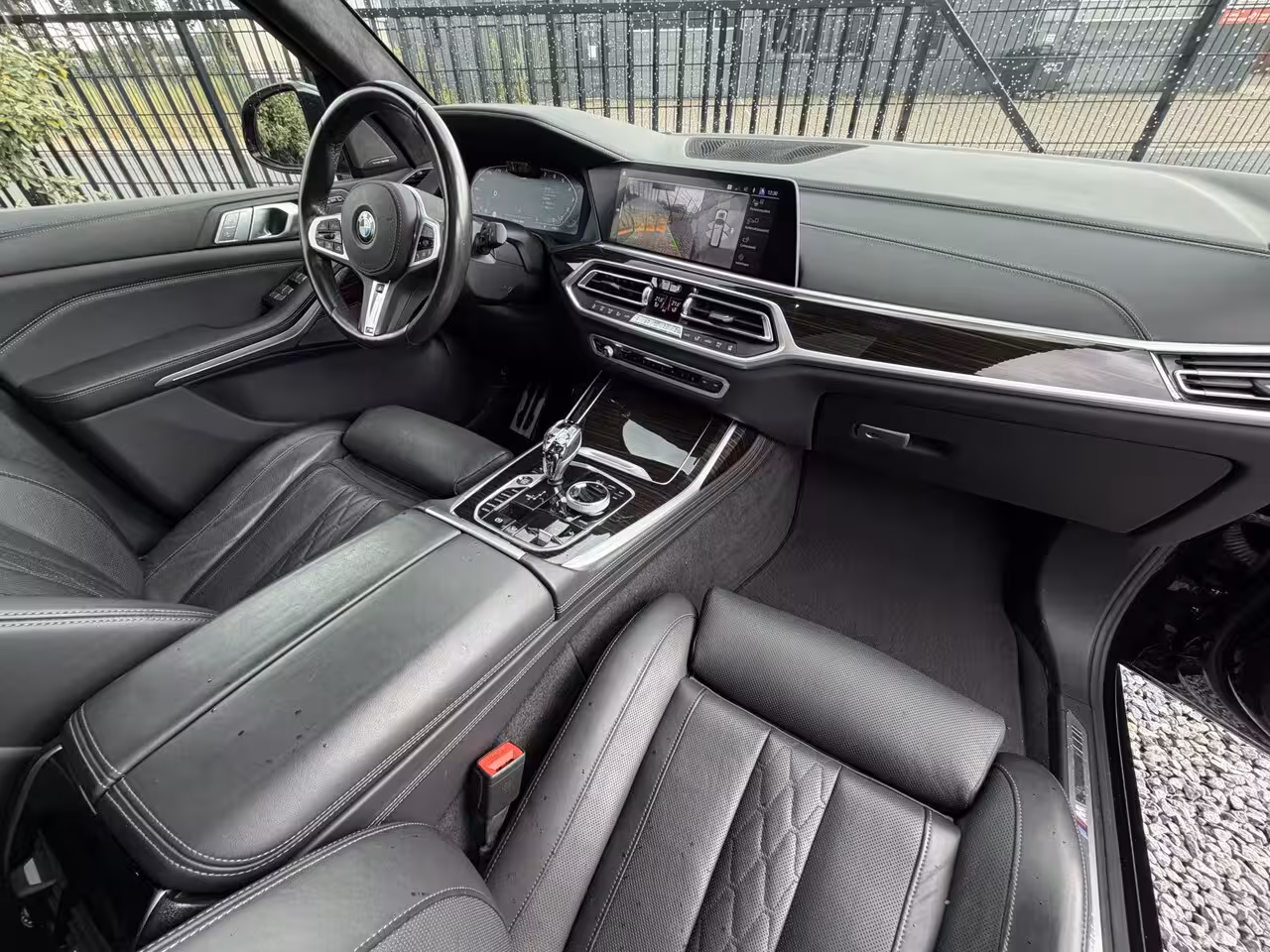 BMW X7 xDrive40i M-Pakket 7 Pers Panodak|Skylounge|Luchtvering Saphire Zwart