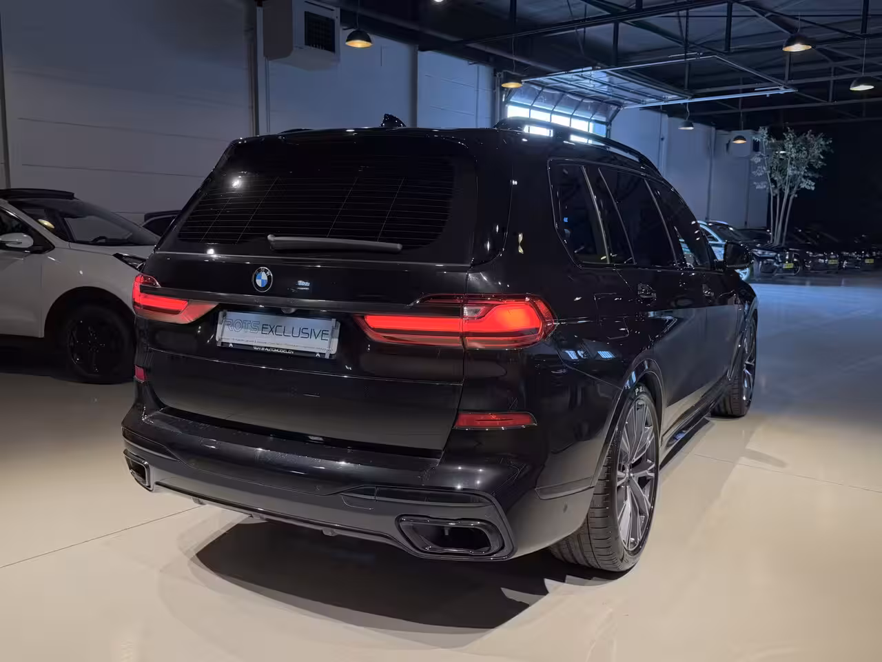 BMW X7 xDrive40i M-Pakket 7 Pers Panodak|Skylounge|Luchtvering Saphire Zwart