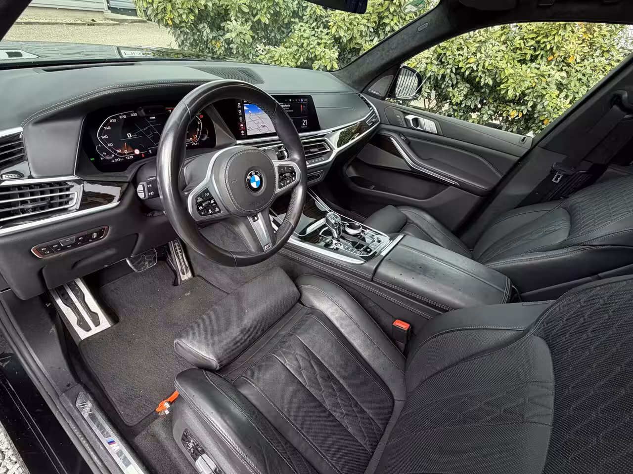 BMW X7 xDrive40i M-Pakket 7 Pers Panodak|Skylounge|Luchtvering Saphire Zwart