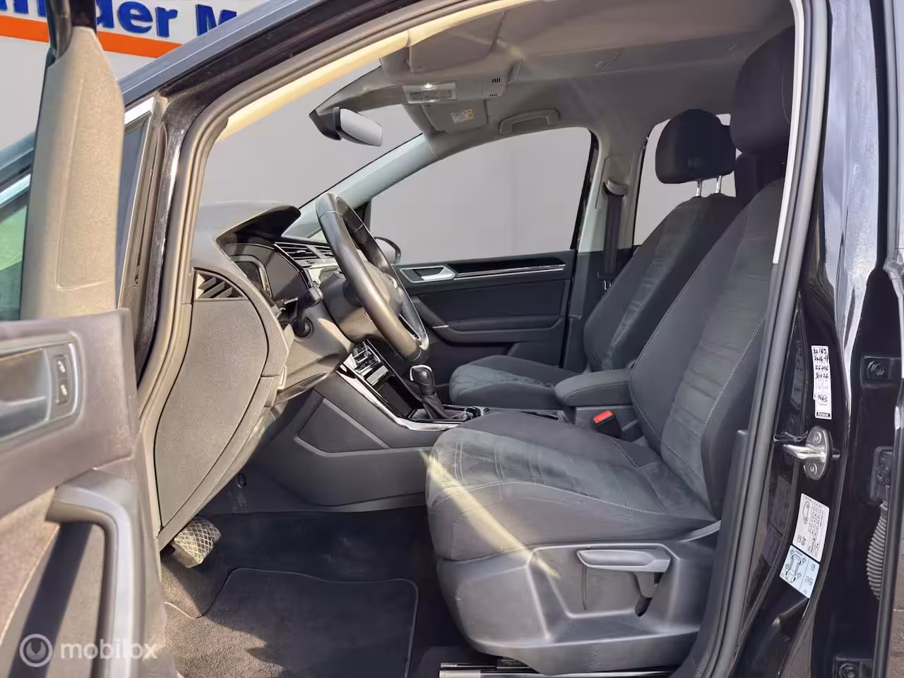 Volkswagen Touran 1.5 TSI Highline 7p All in prijs