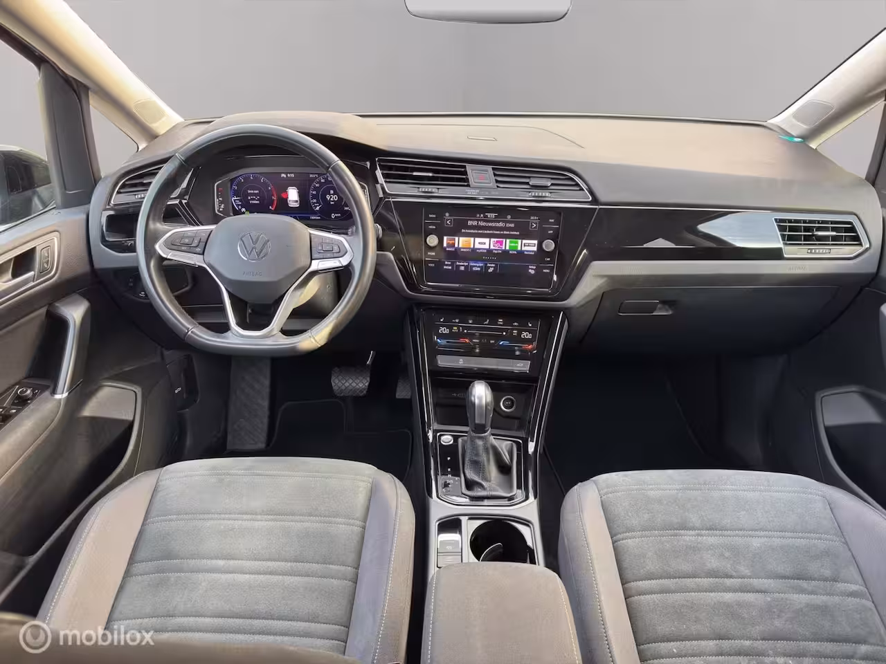 Volkswagen Touran 1.5 TSI Highline 7p All in prijs