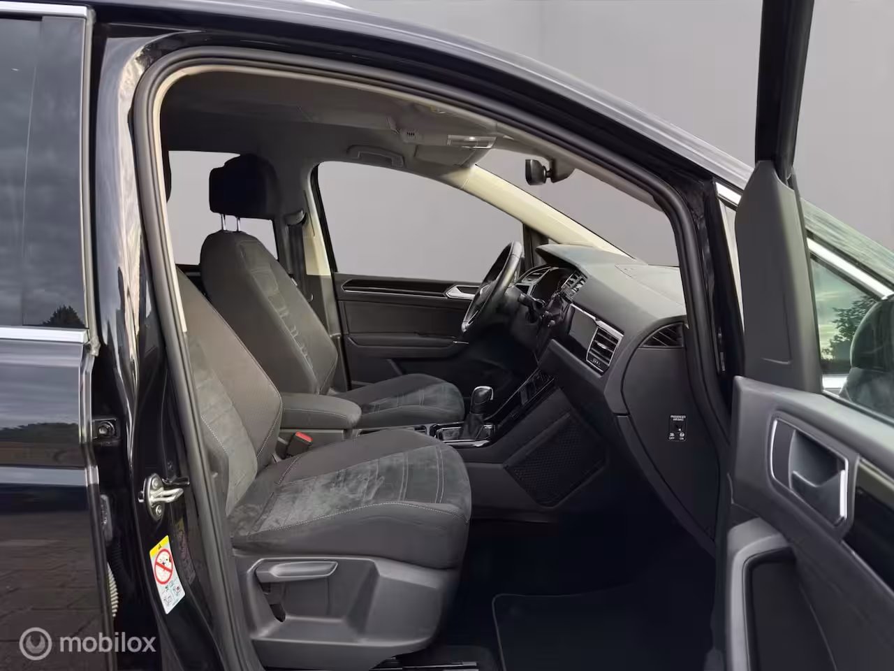 Volkswagen Touran 1.5 TSI Highline 7p All in prijs