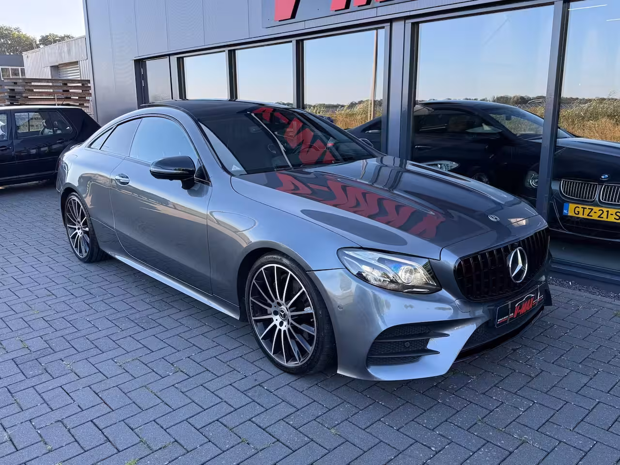 Mercedes-Benz E-klasse Coupé E200 Premium+ AMG HUD Pano Burmester Leder