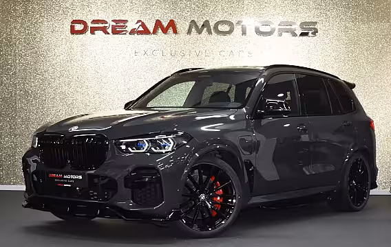 BMW X5 45e M-Sport xDrive 394pk | AKRAPOVIC | MASSAGE | ACHTERASBESTURING | CARBON