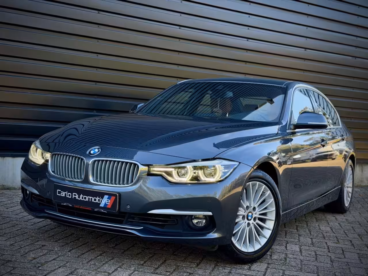 BMW 3-serie 320i INDIVIDUAL VIRTUAL|H/K|360CAM|SPORTLEER