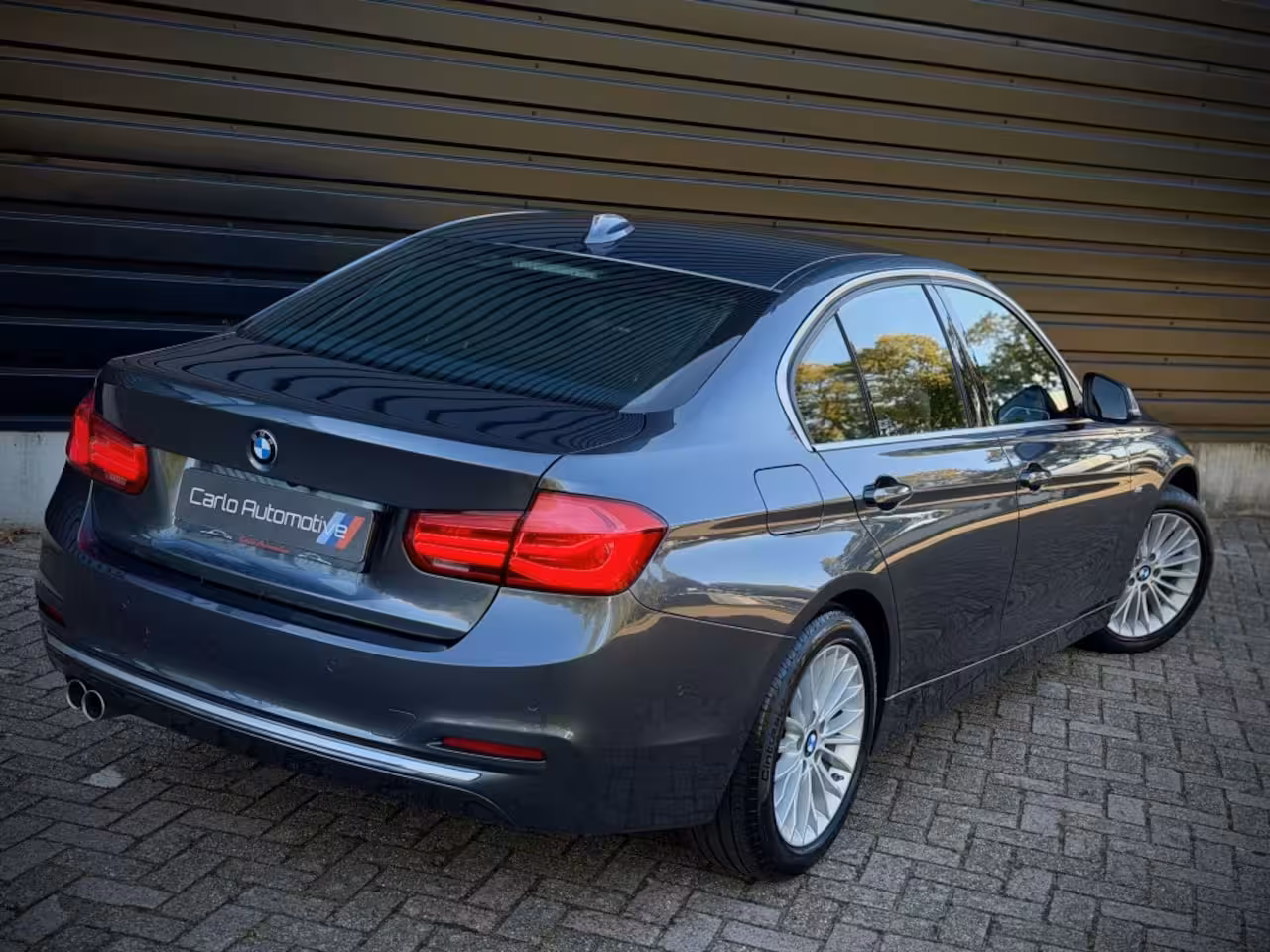 BMW 3-serie 320i INDIVIDUAL VIRTUAL|H/K|360CAM|SPORTLEER