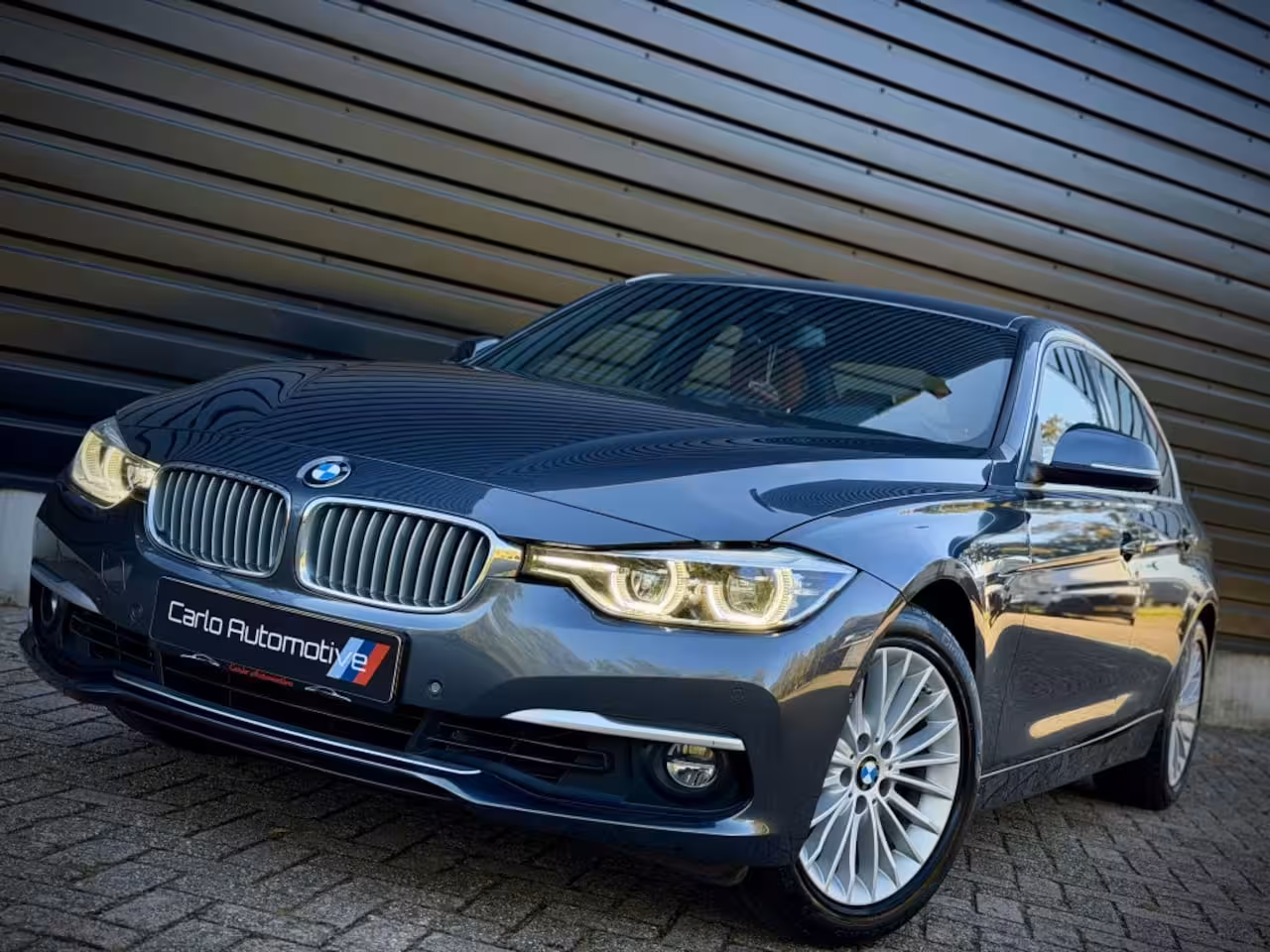 BMW 3-serie 320i INDIVIDUAL VIRTUAL|H/K|360CAM|SPORTLEER