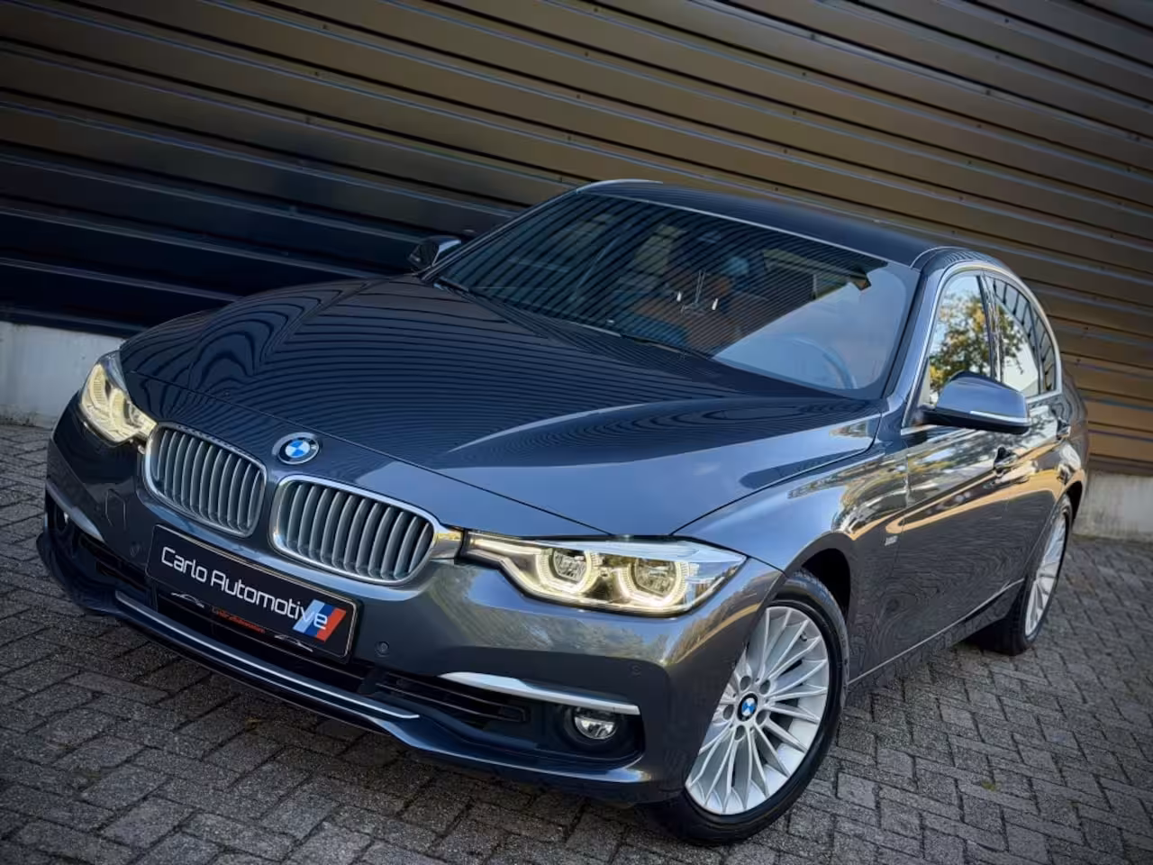 BMW 3-serie 320i INDIVIDUAL VIRTUAL|H/K|360CAM|SPORTLEER