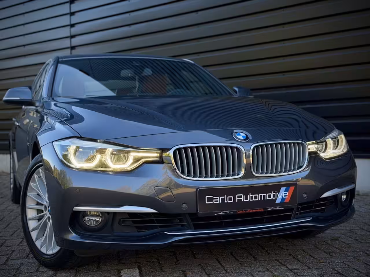 BMW 3-serie 320i INDIVIDUAL VIRTUAL|H/K|360CAM|SPORTLEER