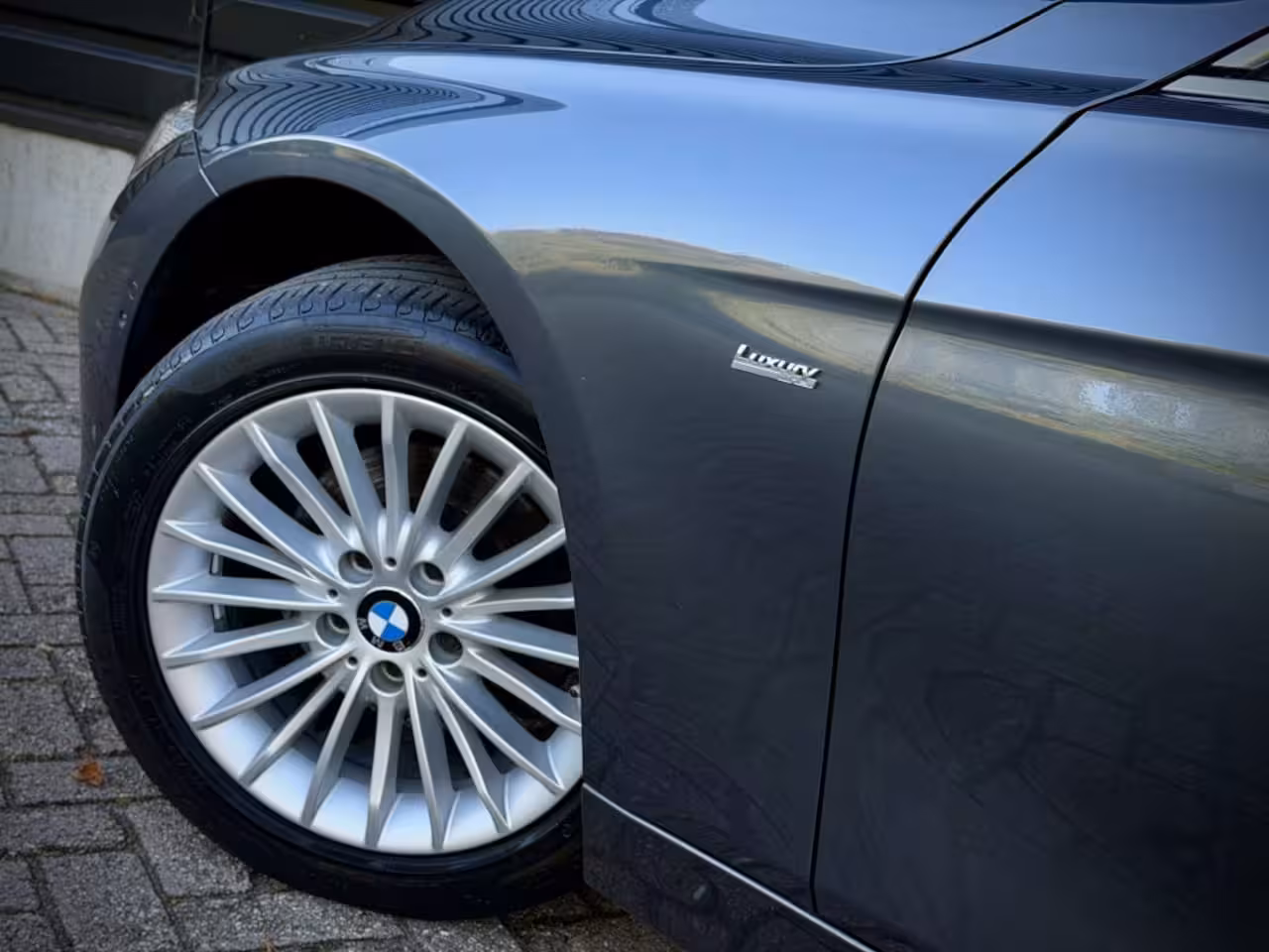 BMW 3-serie 320i INDIVIDUAL VIRTUAL|H/K|360CAM|SPORTLEER