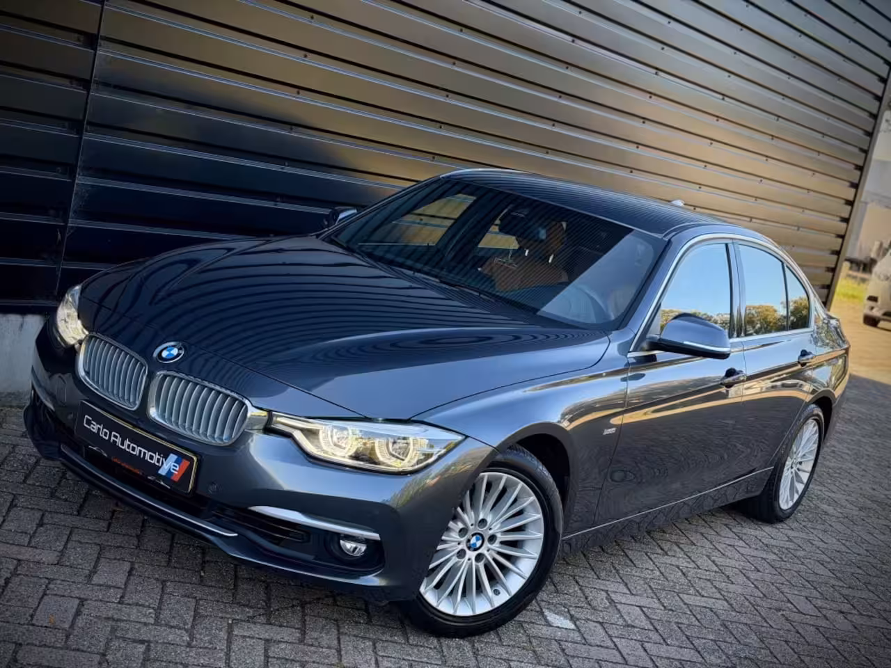 BMW 3-serie 320i INDIVIDUAL VIRTUAL|H/K|360CAM|SPORTLEER