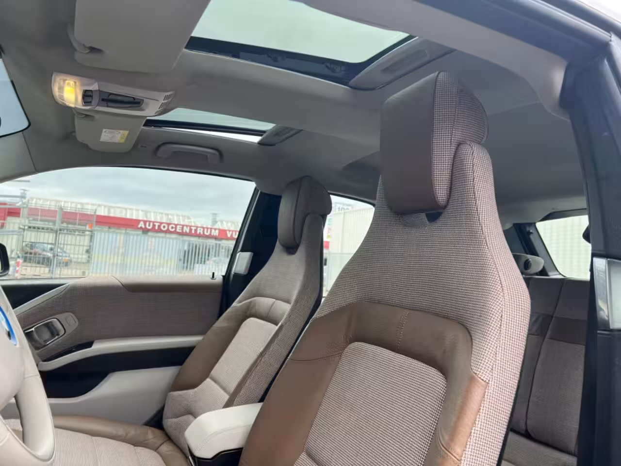 BMW i3 Executive 120Ah 42 kWh/*Lodge*/Sunroof/Adaptive/Kaschmir Silver/Camera/W-pomp/3-fase/20"