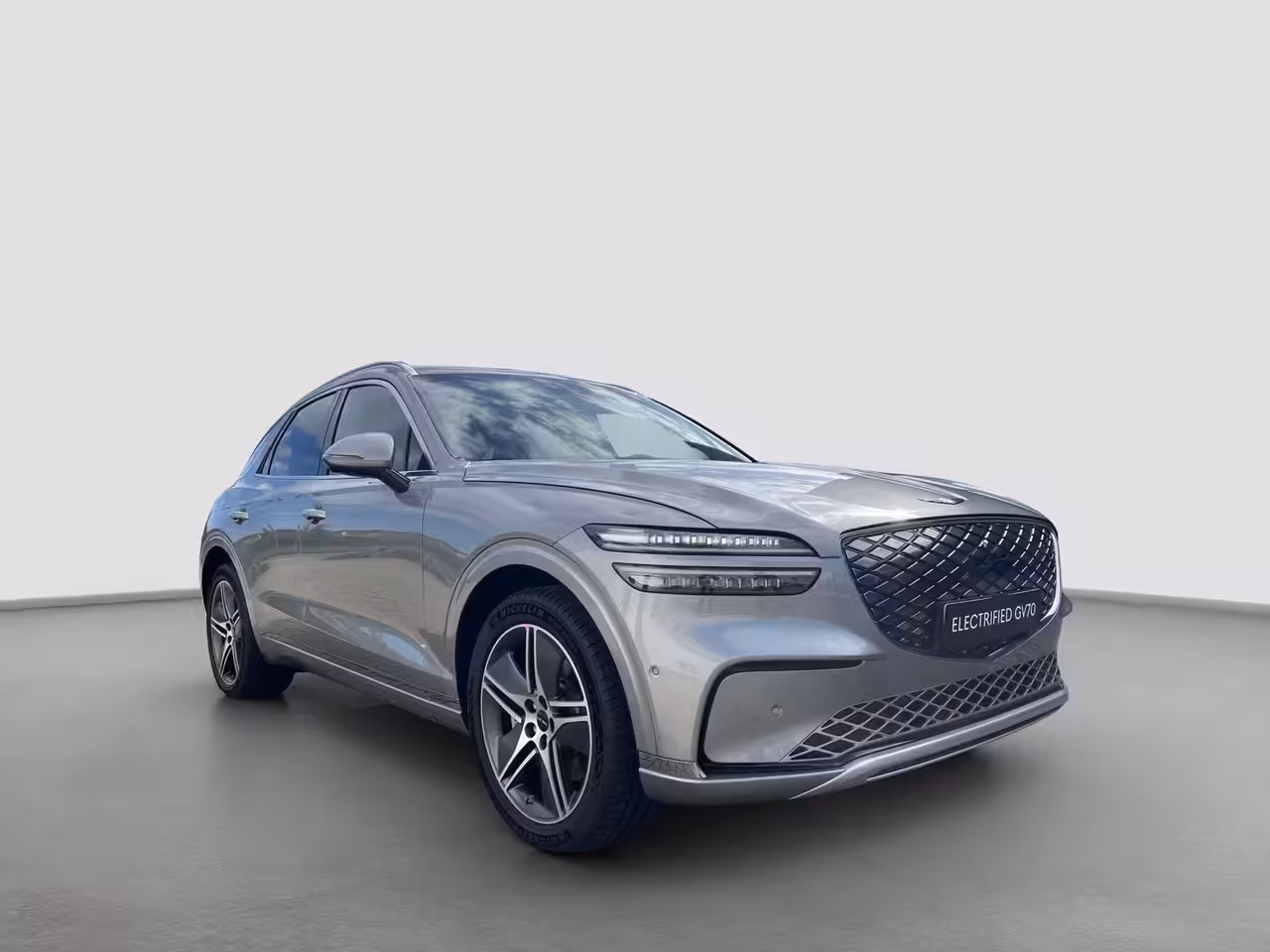 Genesis GV70 84kWh 490pk Luxury | BOMVOL | 4WD |V2L | Panoramadak | Stoelverwarming- ventilatie | Nappa