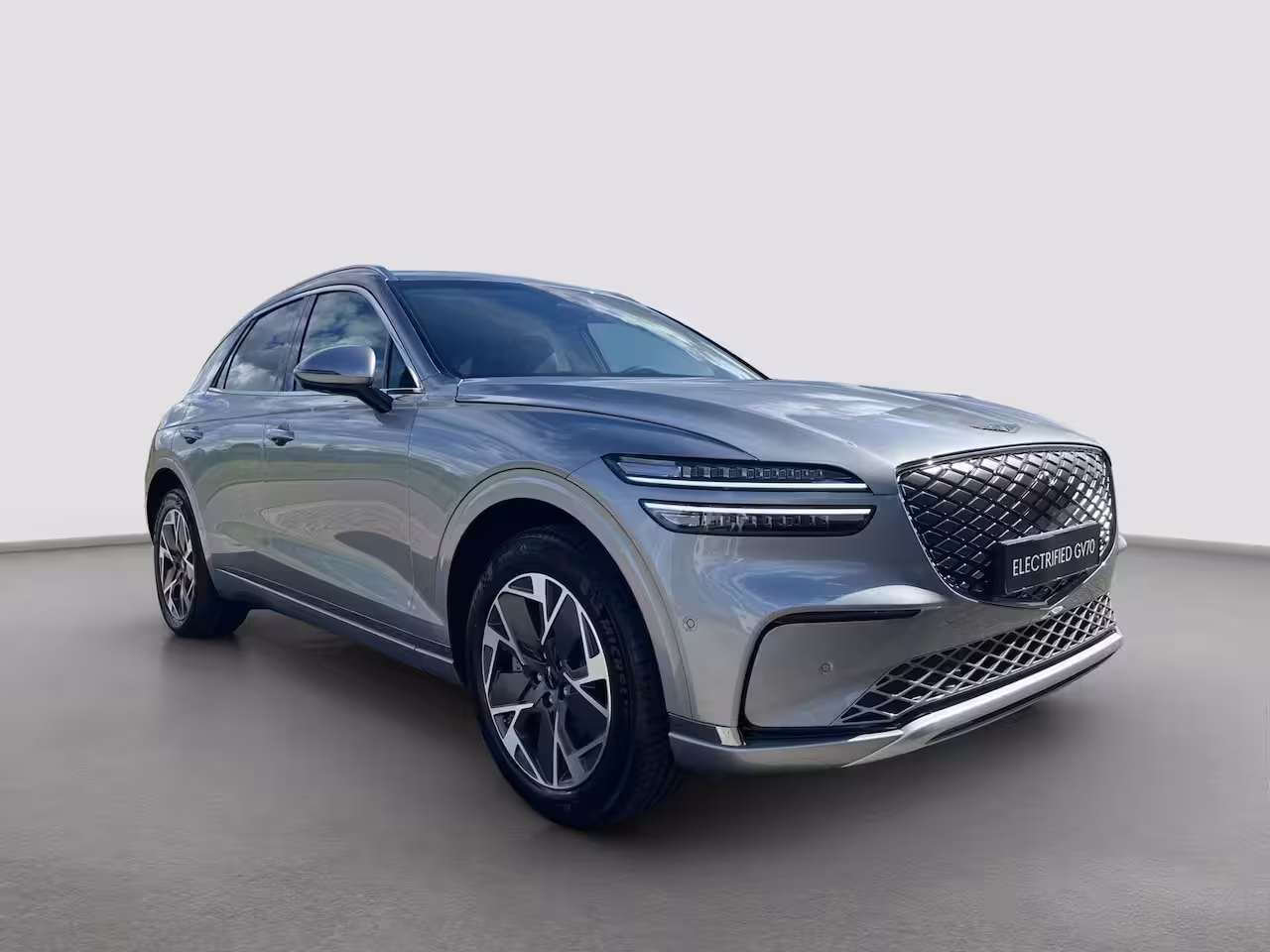 Genesis GV70 84 kWh 490pk AWD First Edition | 360 Camera | Winterpakket | 19" Lichtmetaal | Parkeer Ass