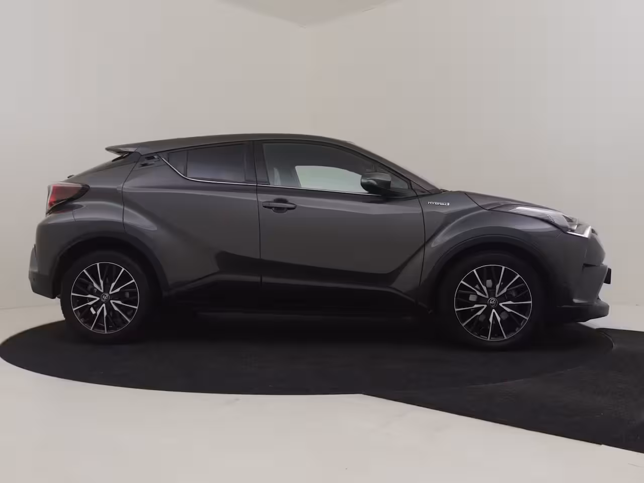 Toyota C-HR 1.8 Hybrid Executive l JBL Sound l Half Leder l Stoelverwarming l Cr Control l PDC V en A