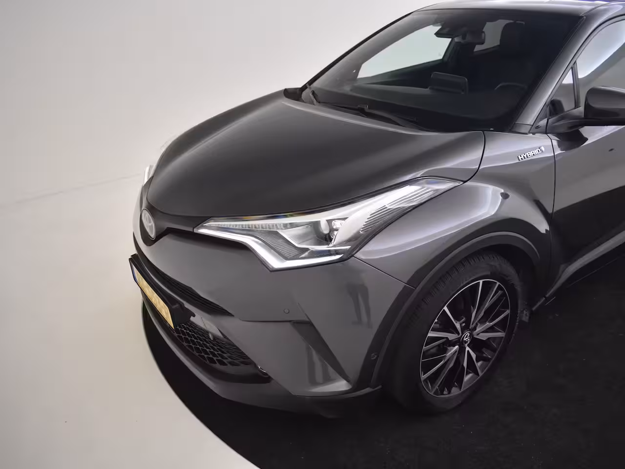 Toyota C-HR 1.8 Hybrid Executive l JBL Sound l Half Leder l Stoelverwarming l Cr Control l PDC V en A