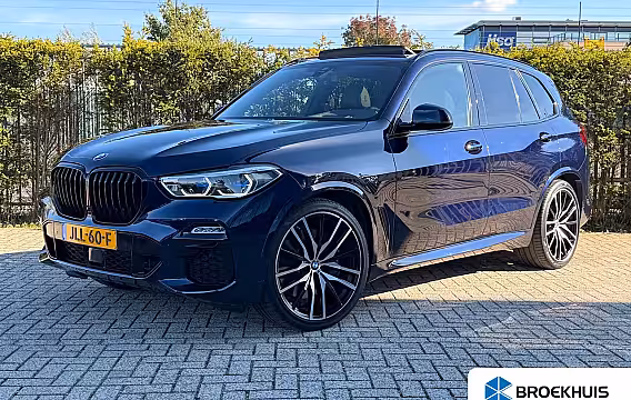 BMW X5 M50i High Executive 530PK | Adapt. Cruise | Softclose | 4-wielsturing | Skylounge | Trekha