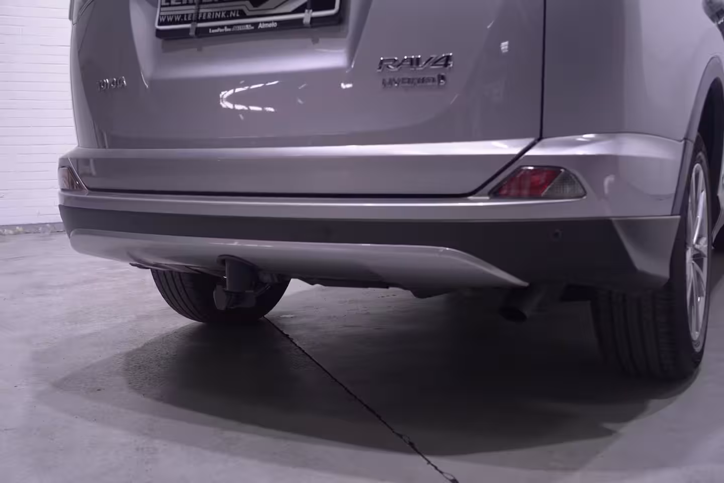 Toyota RAV4 2.5 Hybrid AWD Energy Team-Duitsland navigatie camera 1650kg trekgewicht onderhouds histor