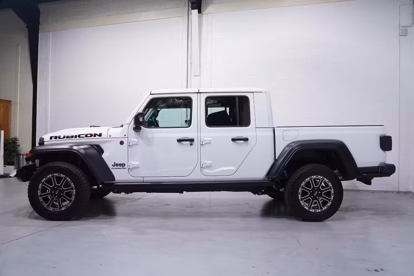 Jeep Gladiator 3.6 V6 285 pk Rubicon Grijs Kenteken 2-Zits Navi Leder Zwart, Adapt. Cruise, Targa Dak, Tr
