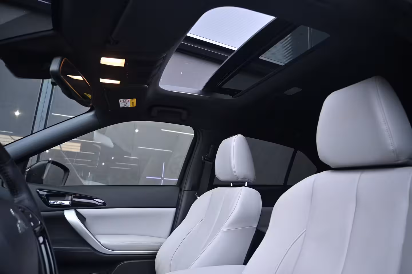 Mitsubishi Eclipse Cross 2.4 PHEV Instyle | Schuif-/Kanteldak | Navigatie | Leder | HUD | Achteruitrijcamera | Stoe