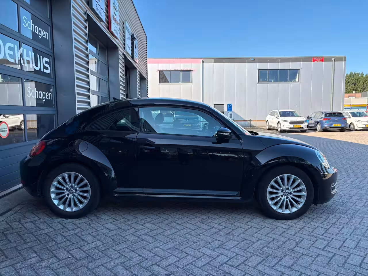 Volkswagen Beetle 1.2 TSI 105 pk Design | Airco | Navigatie | Stoelverwarming |