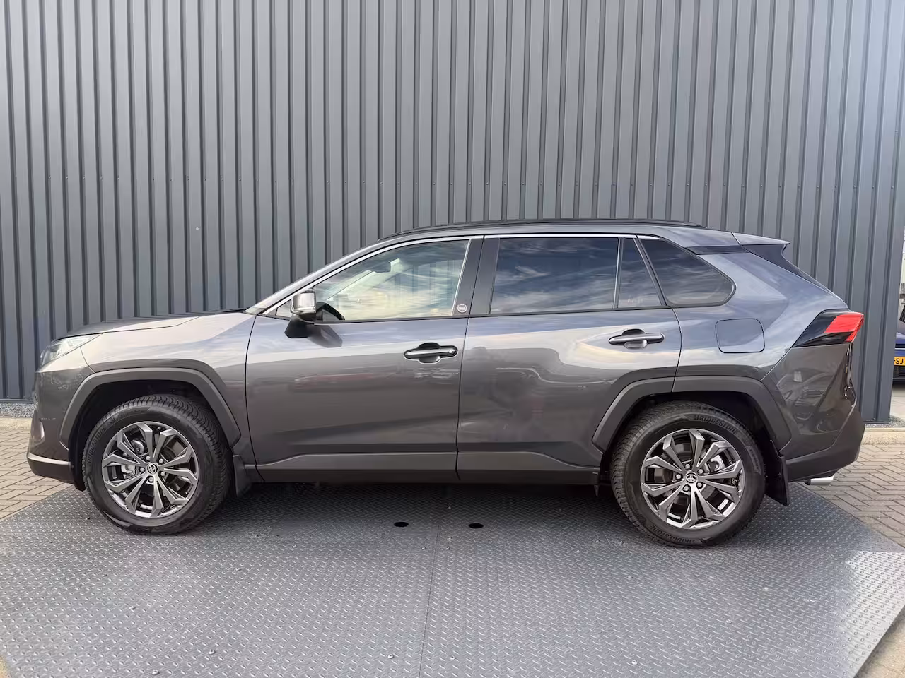 Toyota RAV4 2.5 Hybrid 30 Years Edition | Vol Leer | Afnm. Trekhaak | Allseason banden | BSM | Rijklaa