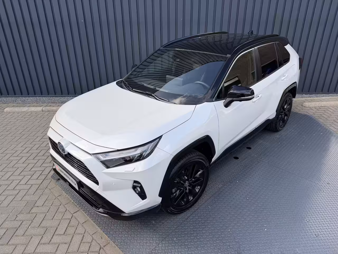 Toyota RAV4 2.5 Hybrid AWD Bi tone | FACELIFT Digitaal dashboard | 360 camera | JBL | Rijklaar
