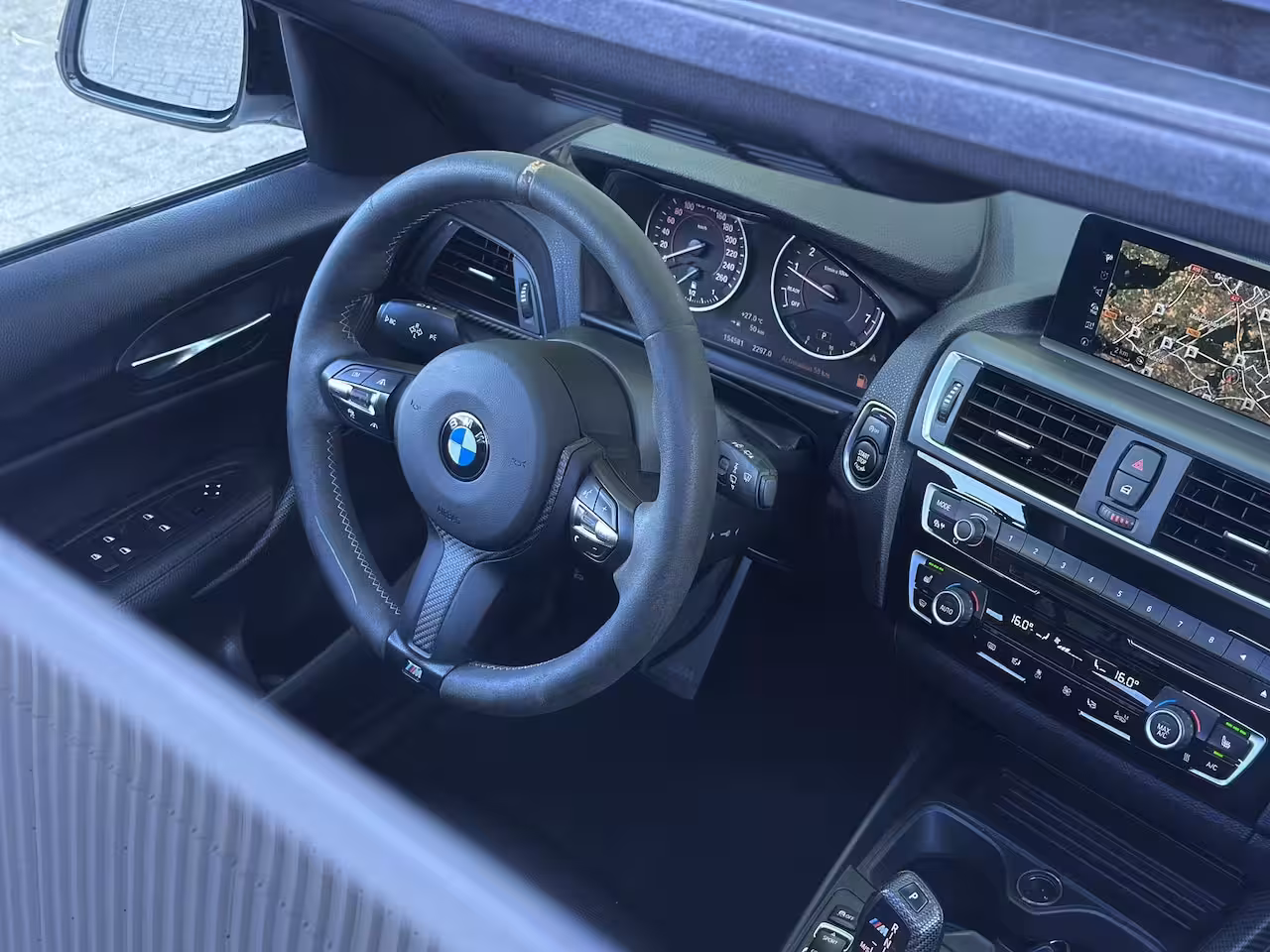 BMW 1-serie 118i M SPORT ACC SCHUIFDAK 100% DEALER ONDERHOUD