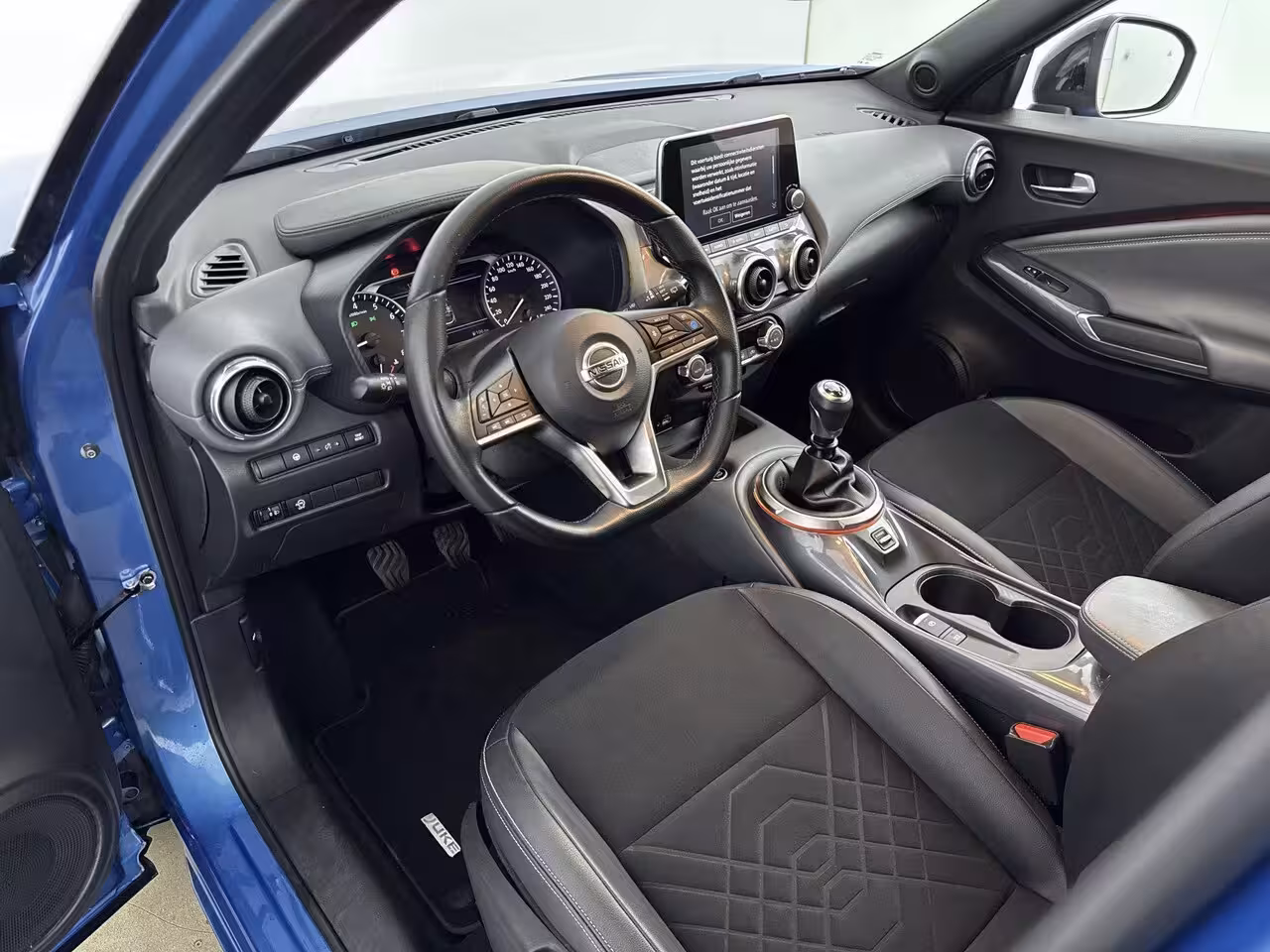 Nissan Juke 1.0 DIG-T Tekna 114PK | Navigatie | BOSE Audio | 360 Graden Camera | Adaptieve Cruise Cont