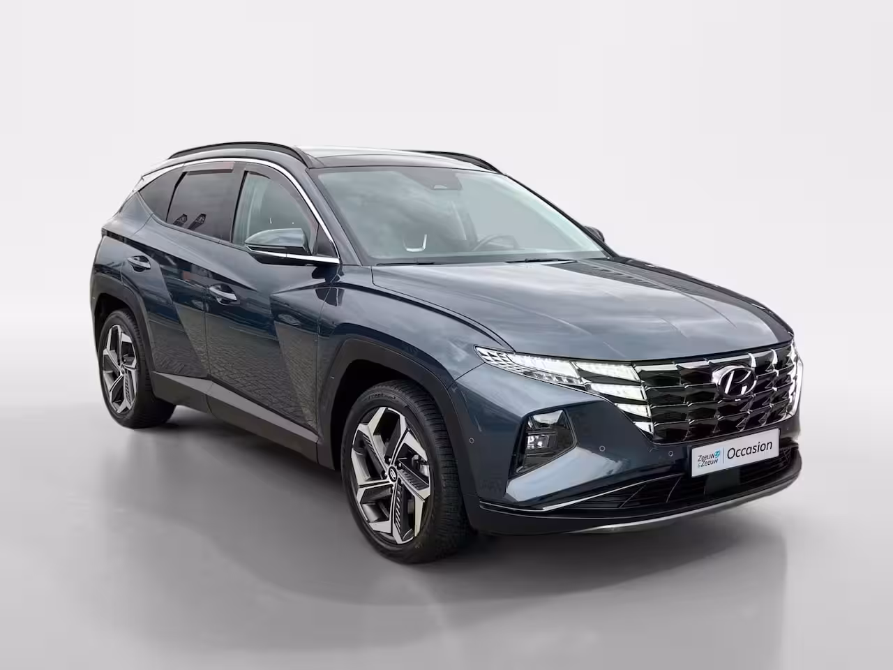 Hyundai Tucson 1.6 T-GDI HEV Premium Sky | + Winterbanden | 1650kg trekgewicht | Navi | 360 Camera | Stoe