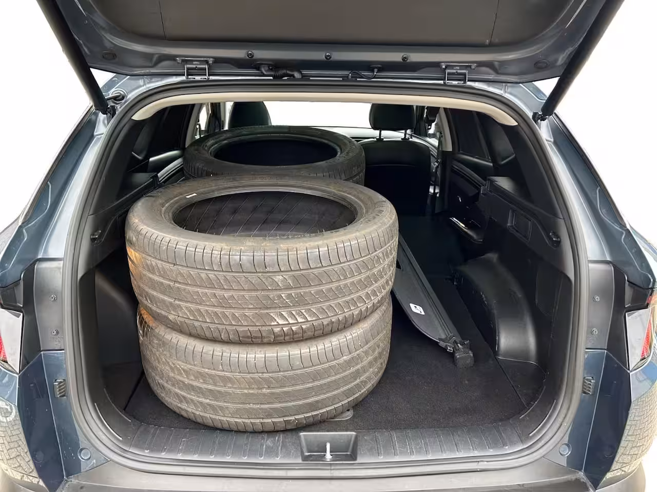 Hyundai Tucson 1.6 T-GDI HEV Premium Sky | + Winterbanden | 1650kg trekgewicht | Navi | 360 Camera | Stoe