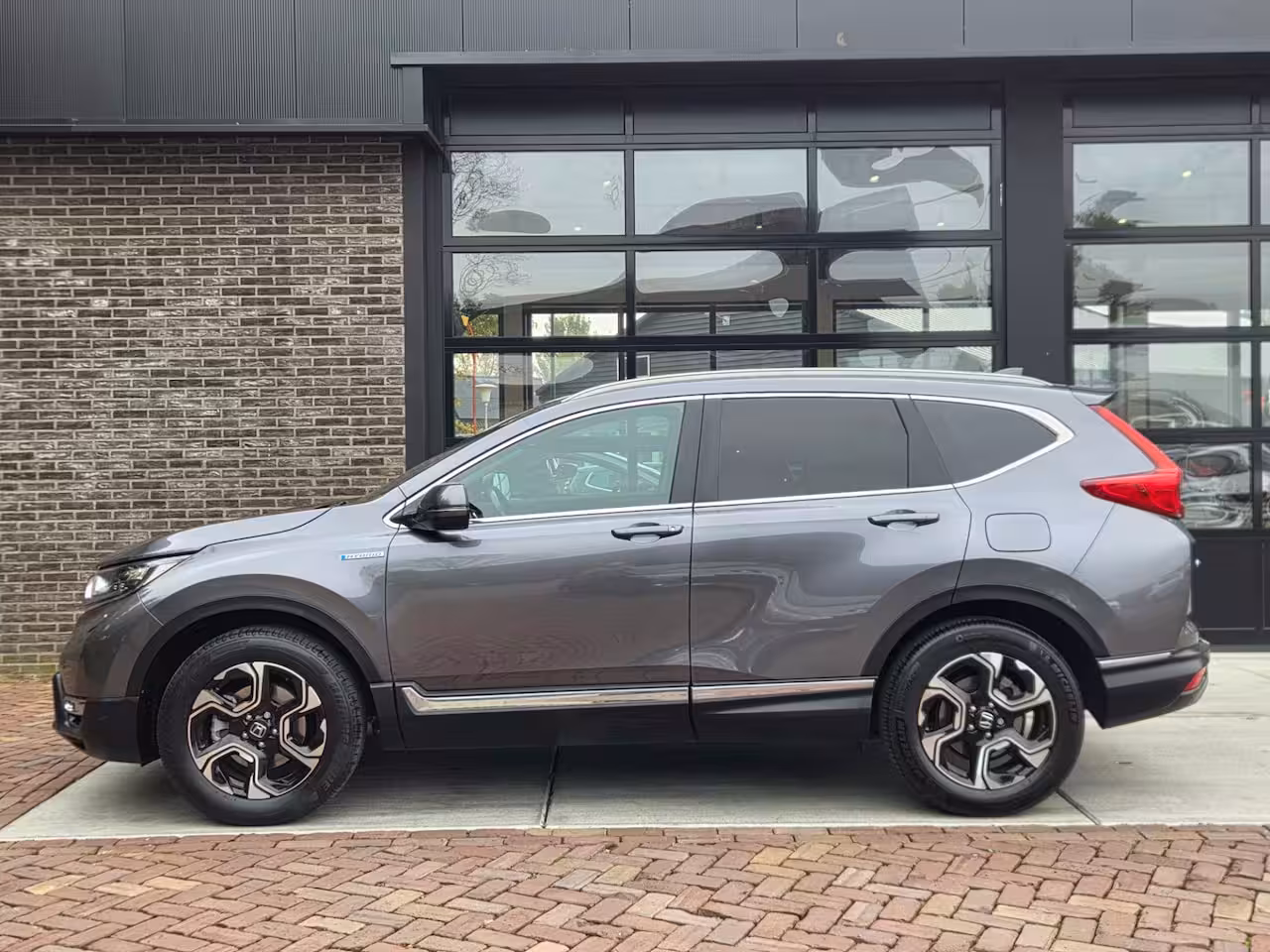Honda CR-V 2.0 Hybrid AWD Lifestyle | Leer | Navi | Camera | Stoelver |