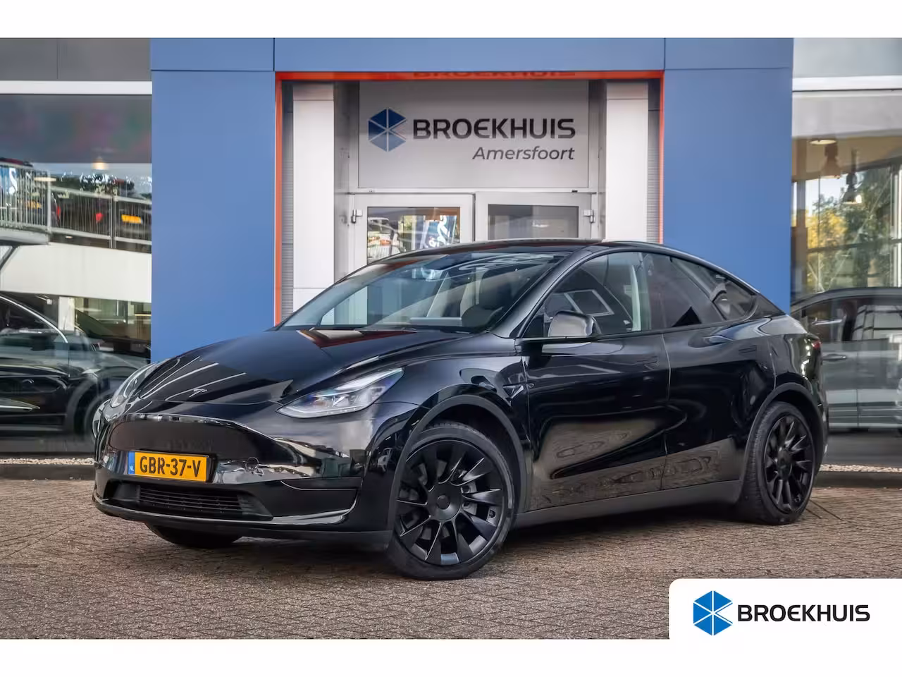 Tesla Model Y RWD 58 kWh | Panoramadak | Elektrisch verstelbare stoel(en) met geheugen | Keyless | Dodeh