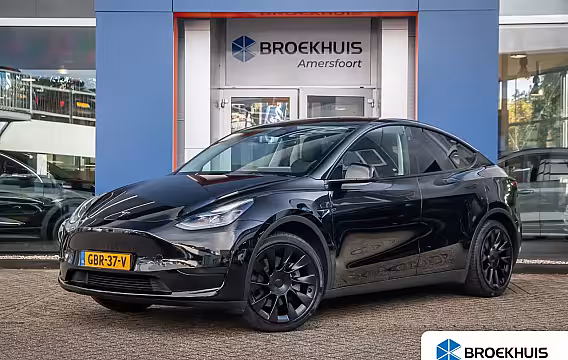 Tesla Model Y RWD 58 kWh | Panoramadak | Elektrisch verstelbare stoel(en) met geheugen | Keyless | Dodeh