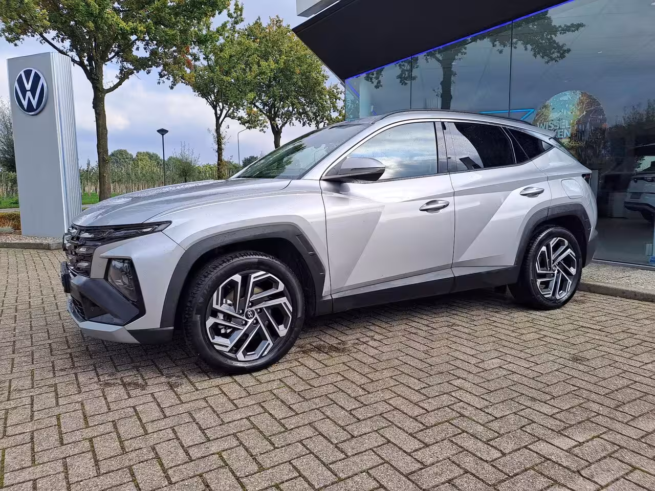 Hyundai Tucson 1.6 T-GDI PHEV Comfort Smart | FACELIFT | CAMERA | STOEL-STUURWIELVERWARMING | NAVIGATIE