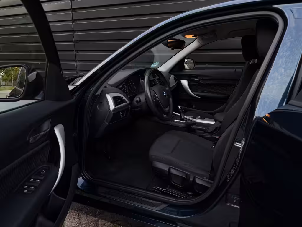 BMW 1-serie 116i Executive AUT|CLIMA|XENON|NAVI|PDC