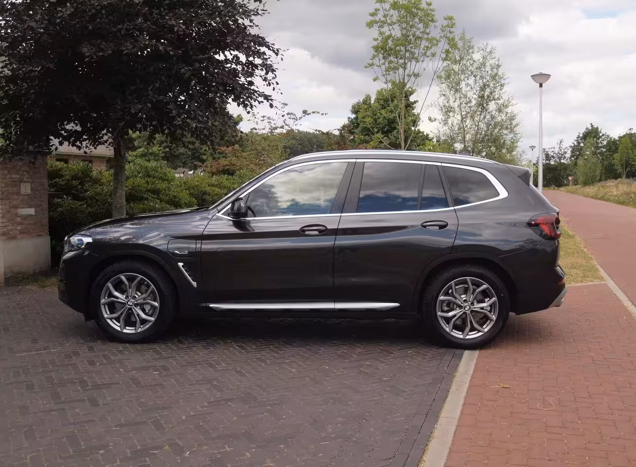 BMW X3 xDrive30e Business Edition Plus | Panoramadak | Head-Up Display | Camera | Sfeerverlichtin